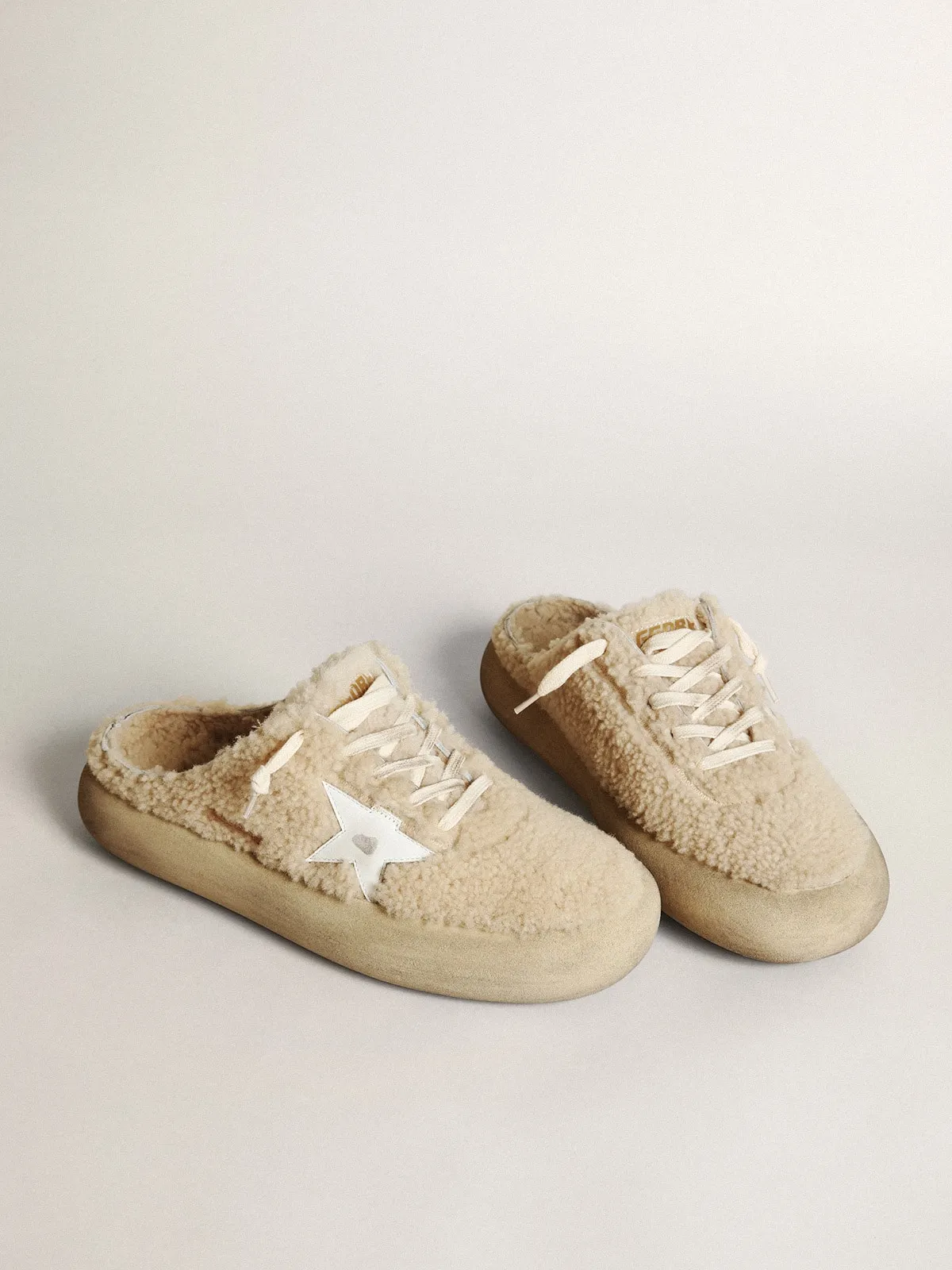 Men’s Space-Star Sabots in beige shearling with white leather star