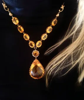 Portable sunshine - citrine and diamond necklace in gold