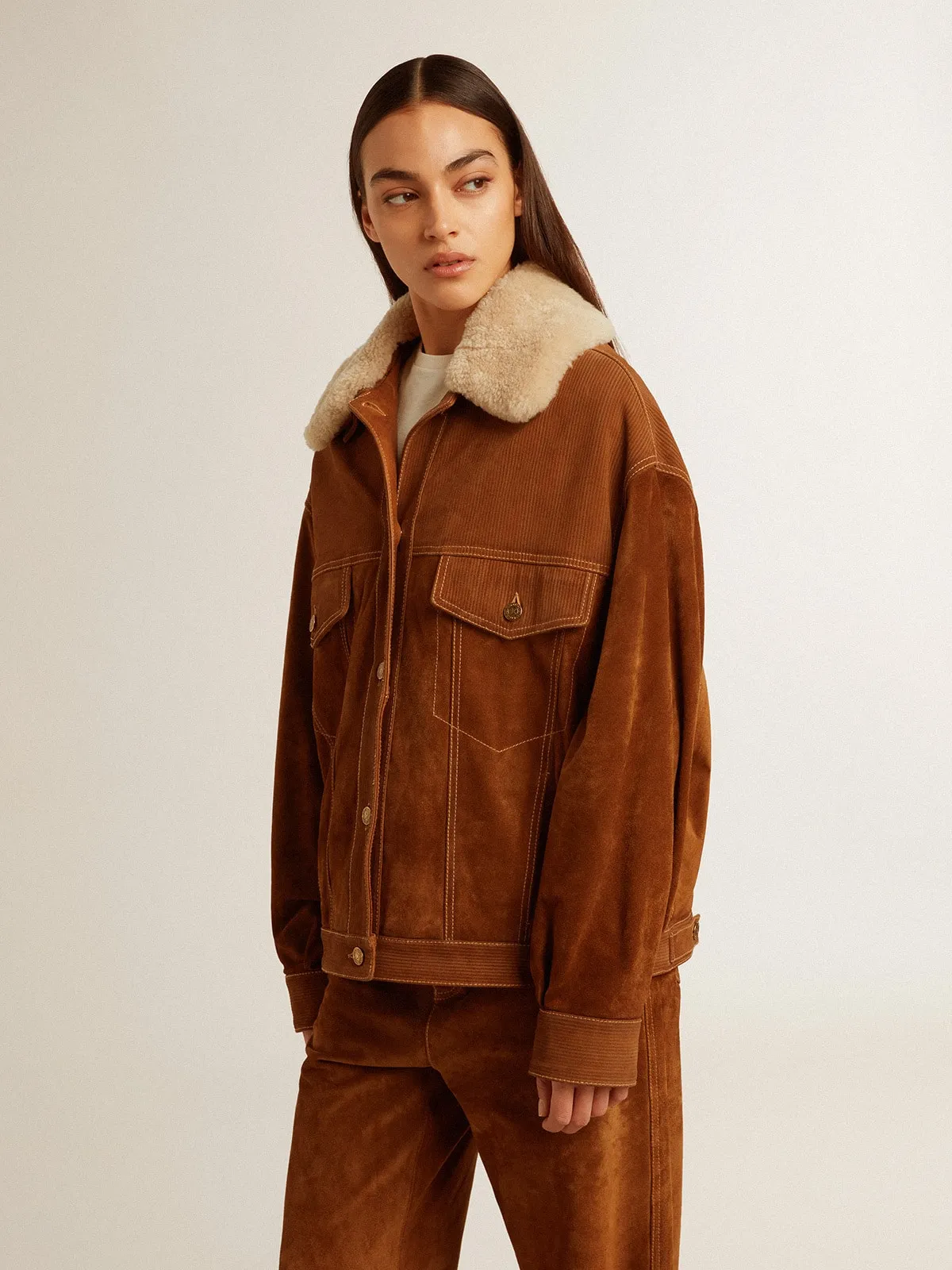 Women's jacket in tobacco-colored split leather with a shearling collar