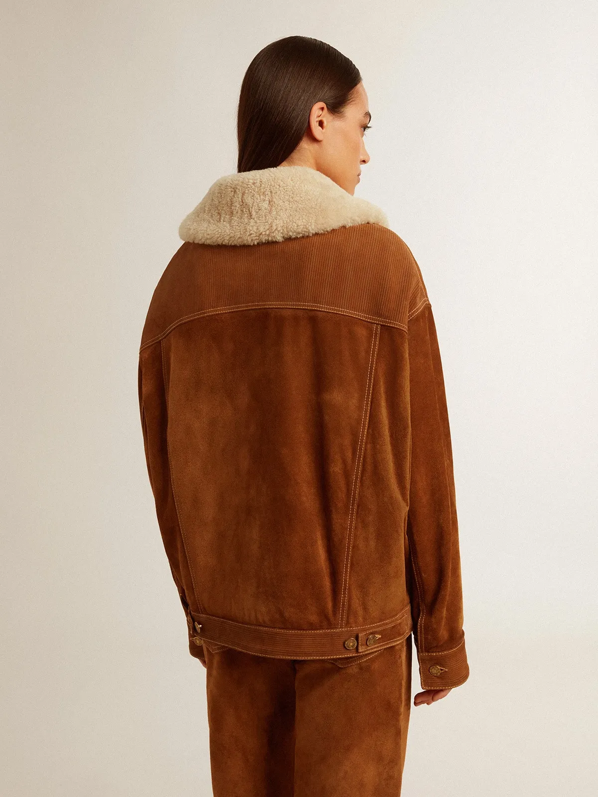 Women's jacket in tobacco-colored split leather with a shearling collar