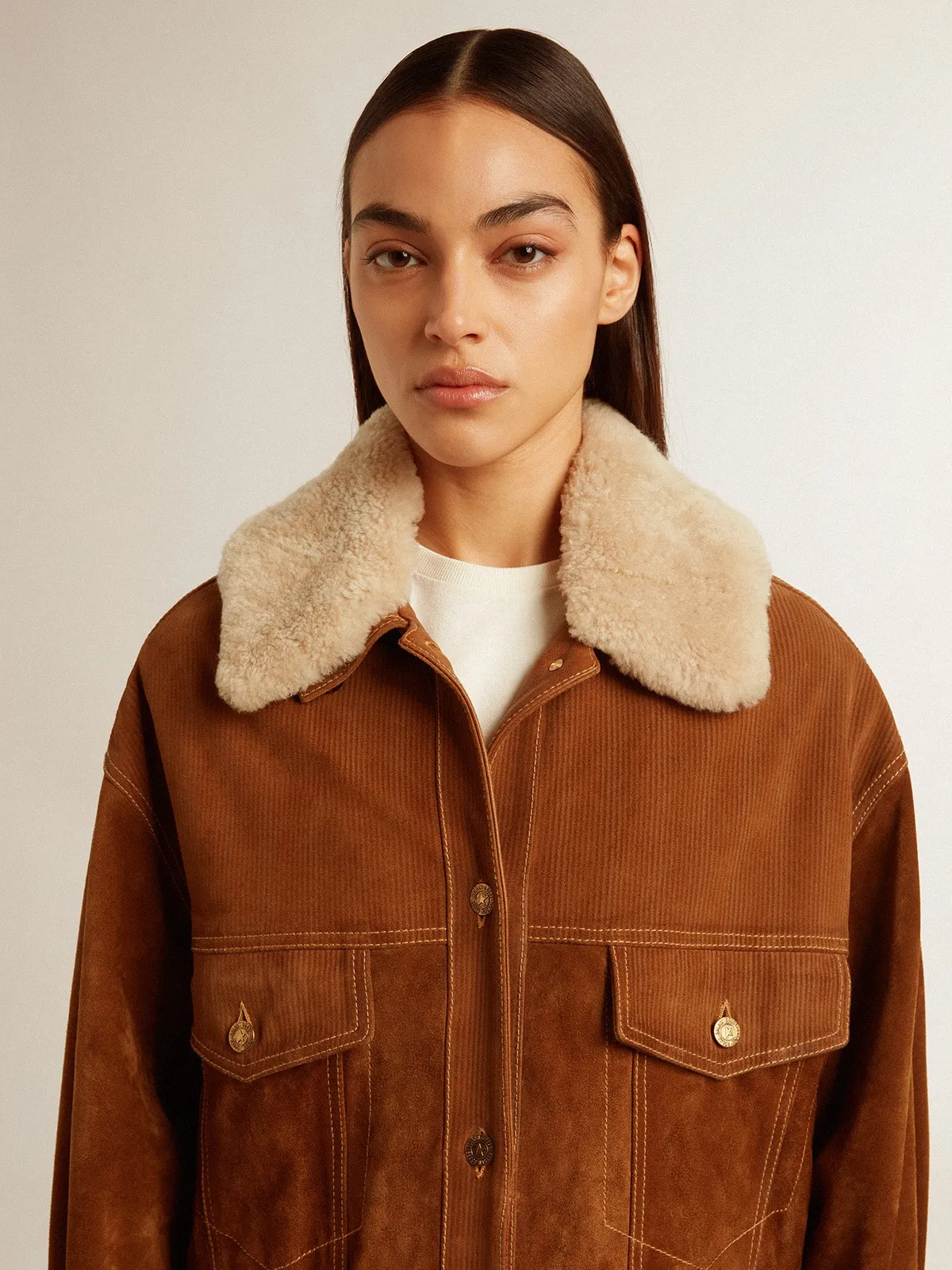 Women's jacket in tobacco-colored split leather with a shearling collar